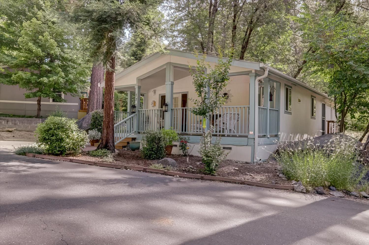 251 Willow Valley Road, Unit 17 Nevada City, CA 95959 - Photo 46 of 58 a front view of a house with garden