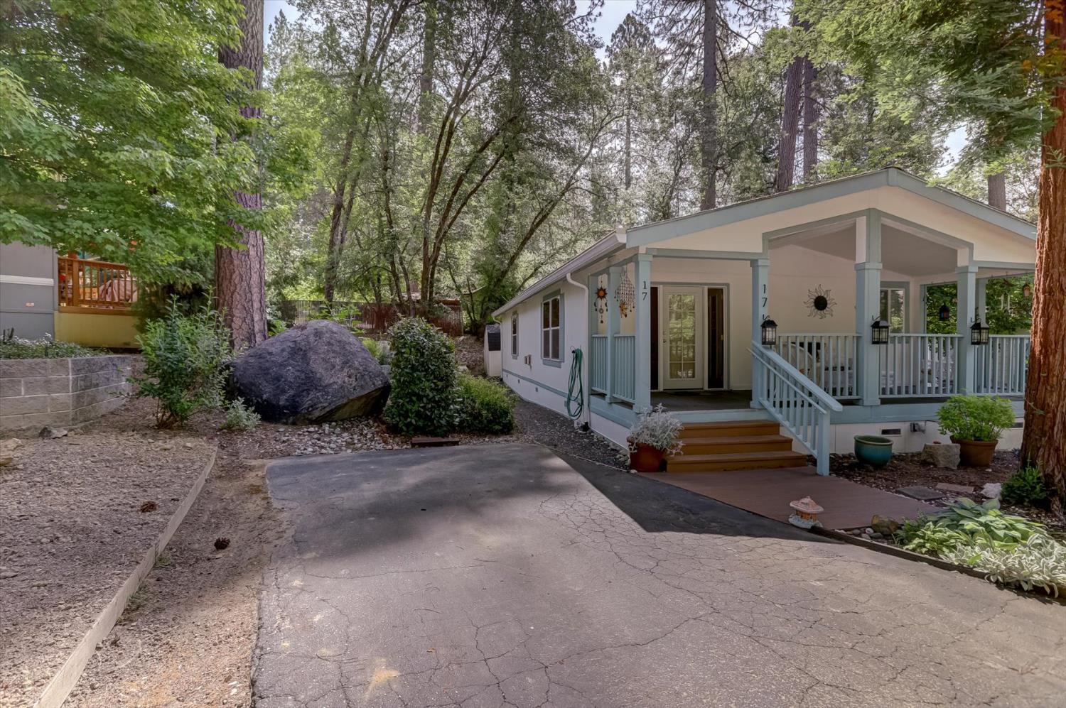 251 Willow Valley Road, Unit 17 Nevada City, CA 95959 - Photo 47 of 58 a view of a house with backyard and sitting area