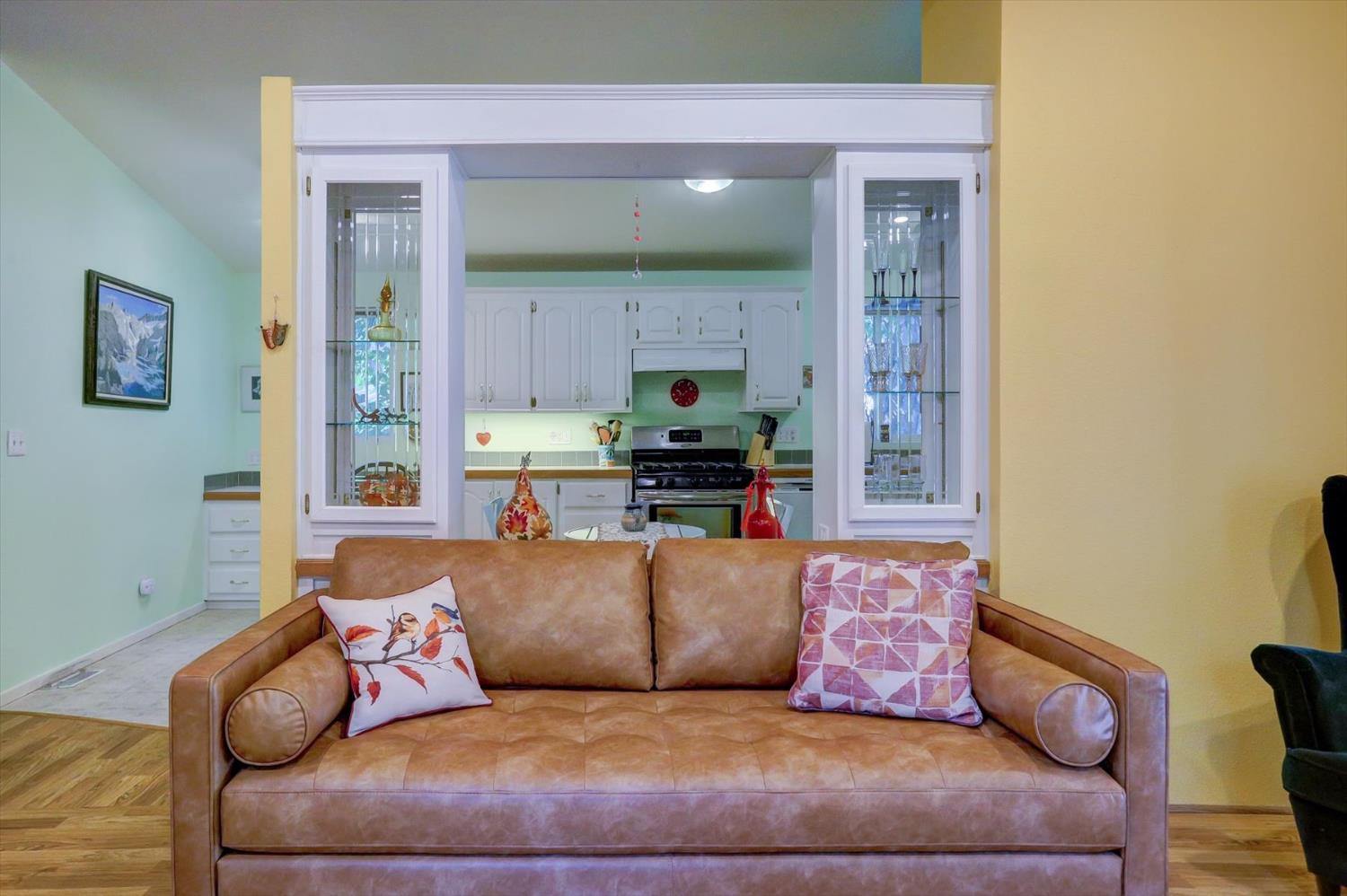 251 Willow Valley Road, Unit 17 Nevada City, CA 95959 - Photo 9 of 58 a living room with furniture and a fireplace