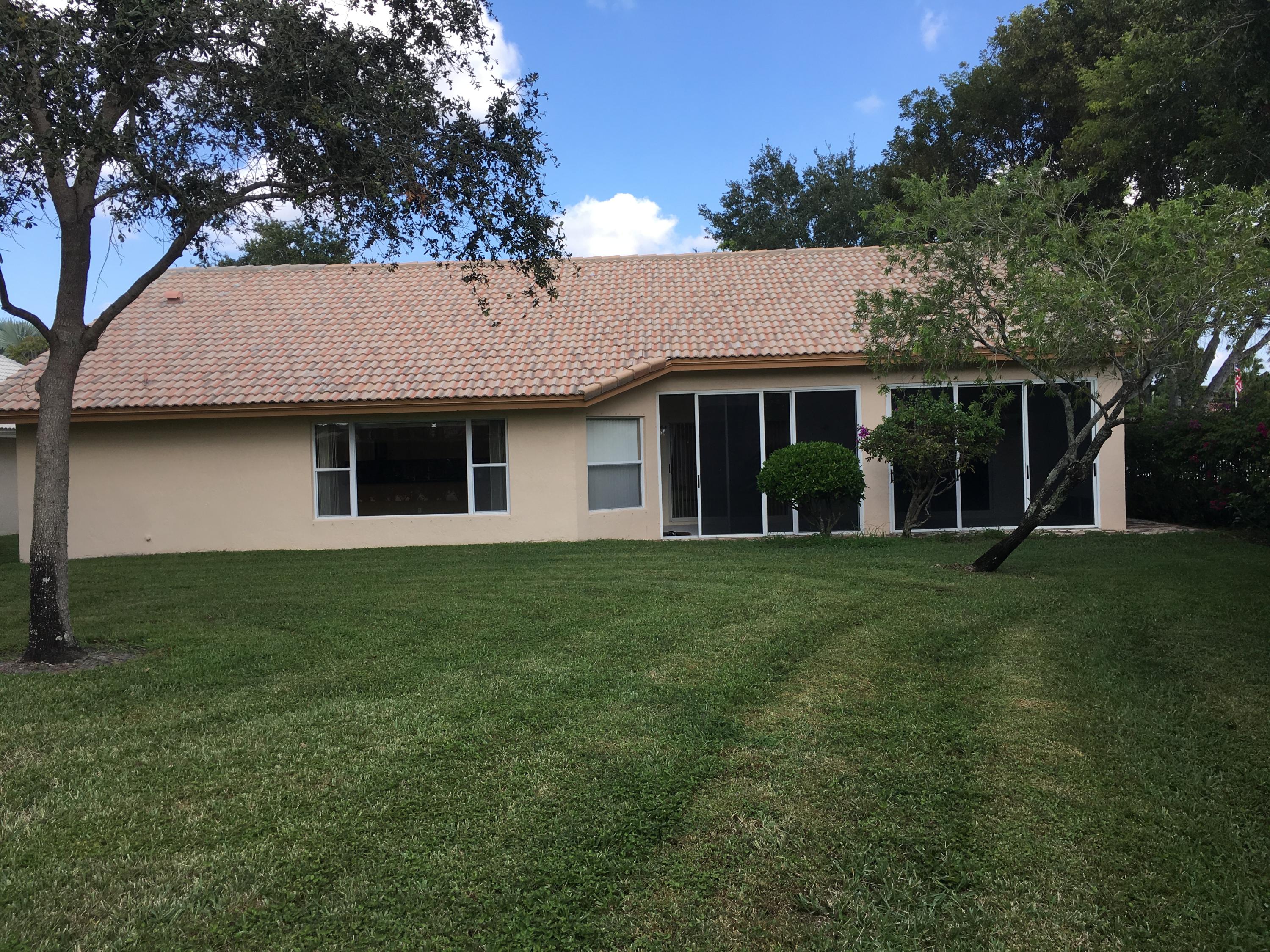 6828 Sun River Road Boynton Beach, FL 33437 - Photo 23 of 46 Yard has room for Tennis