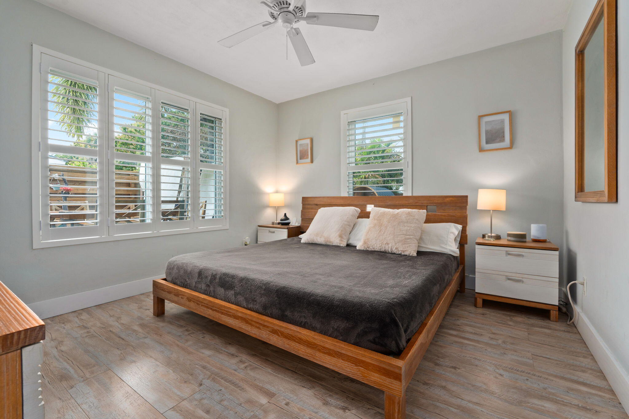 819 Southeast Stypmann Boulevard Stuart, FL 34994 - Photo 11 of 31 a bedroom with bed and window