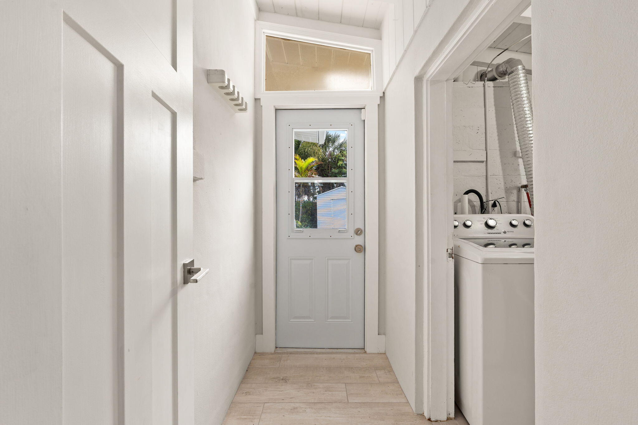 819 Southeast Stypmann Boulevard Stuart, FL 34994 - Photo 18 of 31 a bathroom with a sink a mirror and a shower