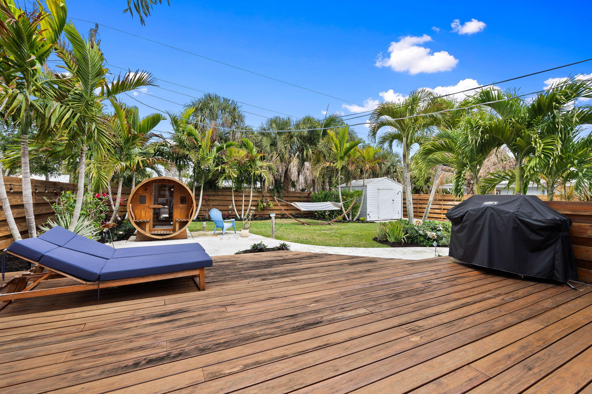 819 Southeast Stypmann Boulevard Stuart, FL 34994 - Photo 28 of 31 a front view of a house with a yard