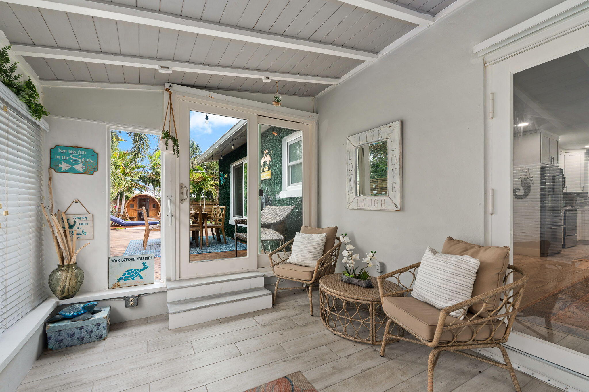 819 Southeast Stypmann Boulevard Stuart, FL 34994 - Photo 4 of 31 a living room with furniture and wooden floor
