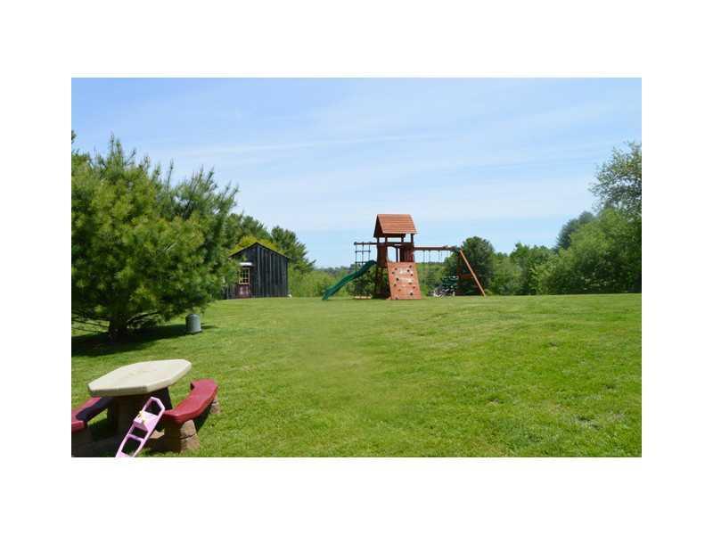 30 Mill Road North Yarmouth, ME 04097 - Photo 28 of 35 Back Yard. Lush lawns make playing...