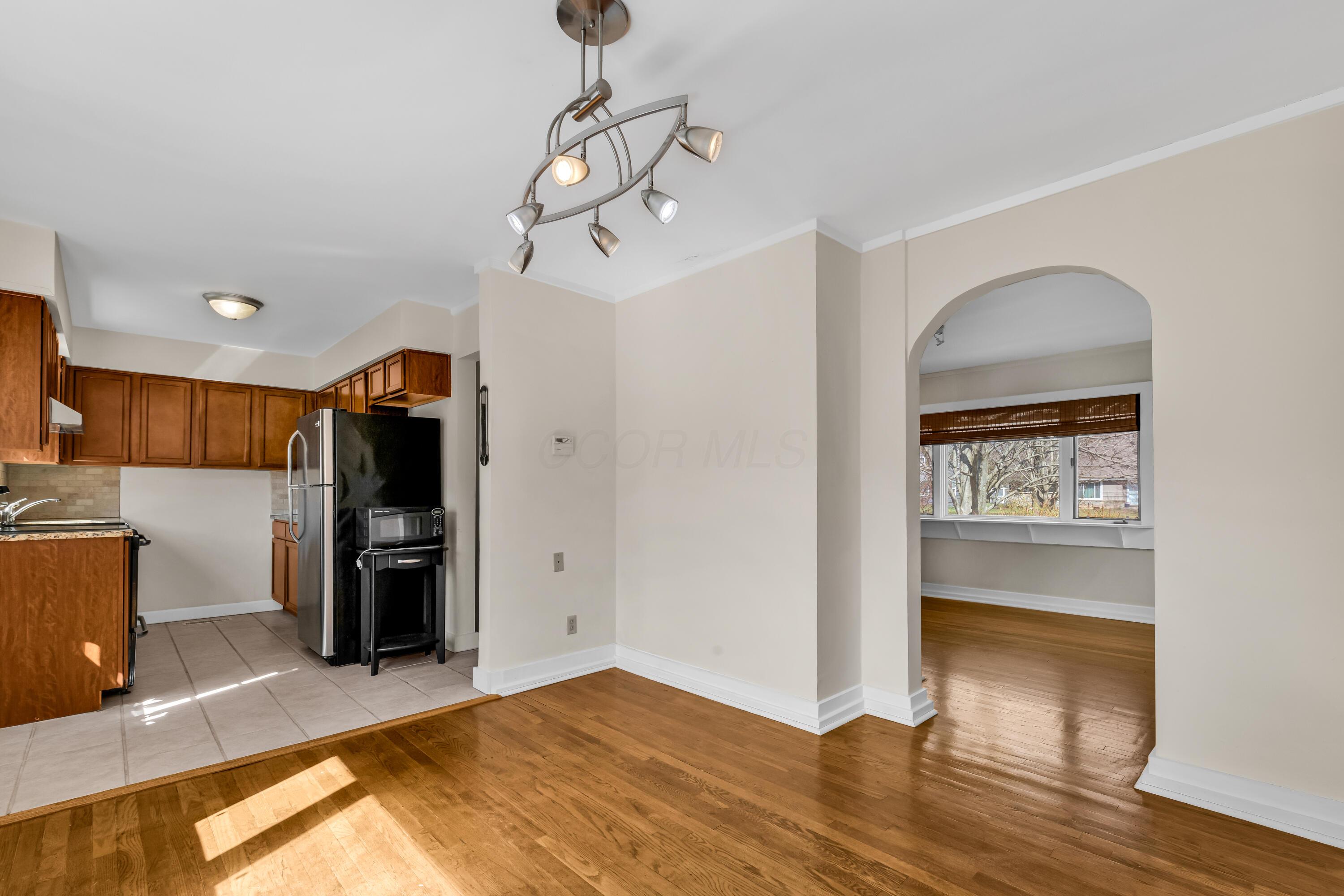 2033 Zollinger Road Columbus, OH 43221 - Photo 14 of 44 • Hardwood flooring
• Ivory painted walls
• Chandelier