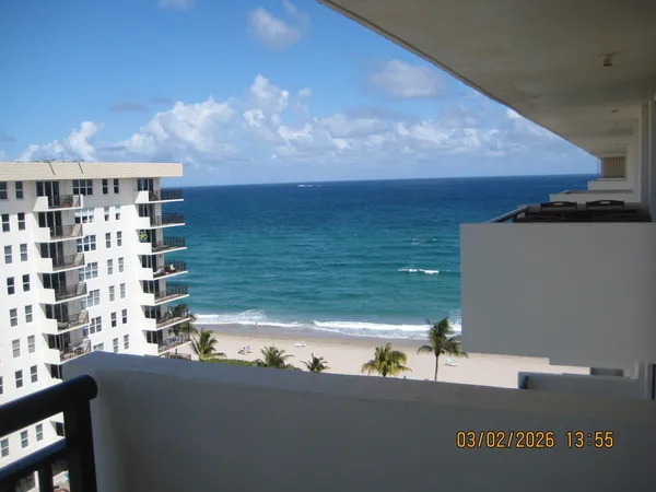 a kitchen with a sink appliances and cabinets