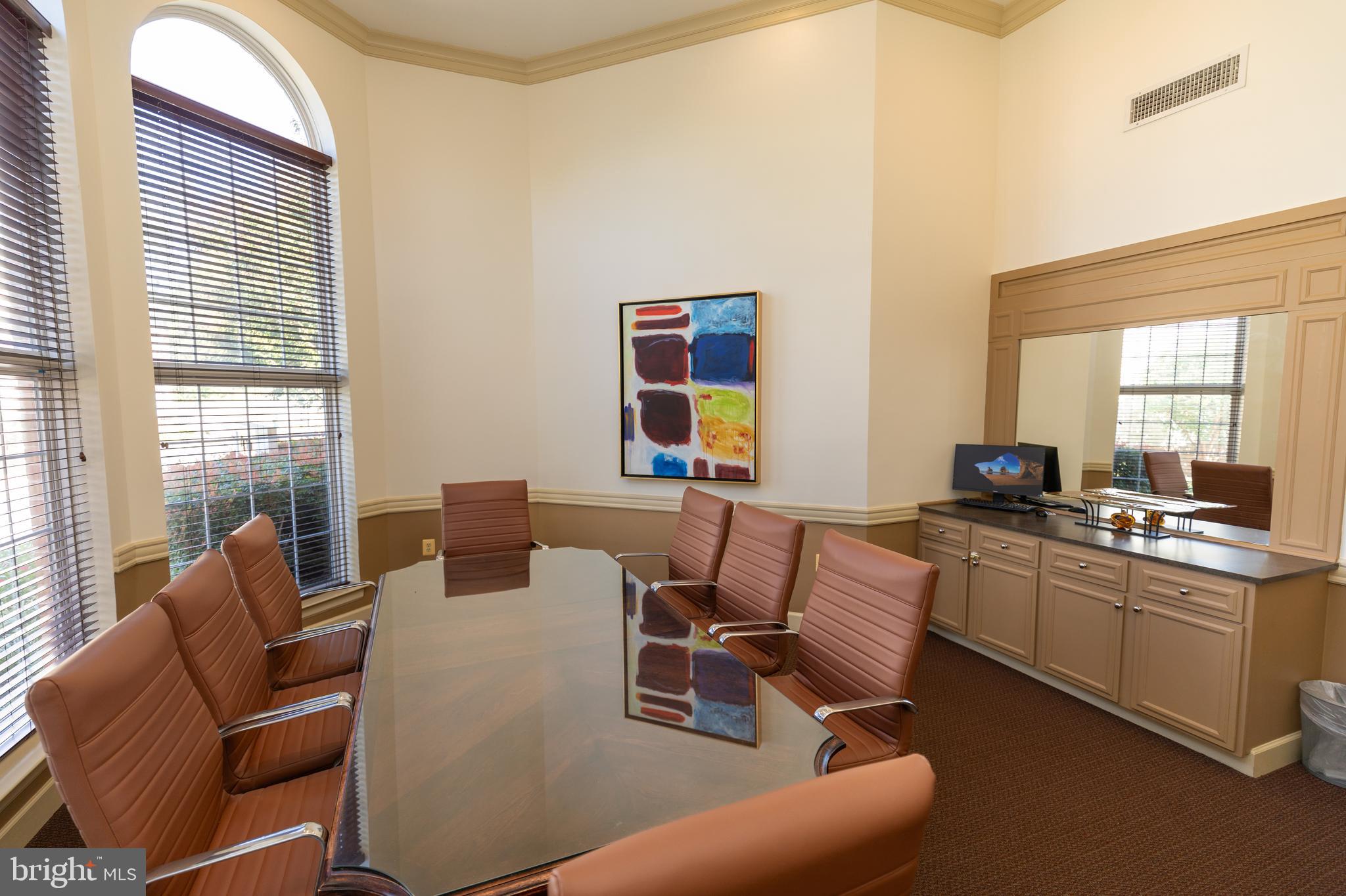 400 Symphony Circle, Unit 418H Cockeysville, MD 21030 - Photo 5 of 17 a work room with furniture and windows