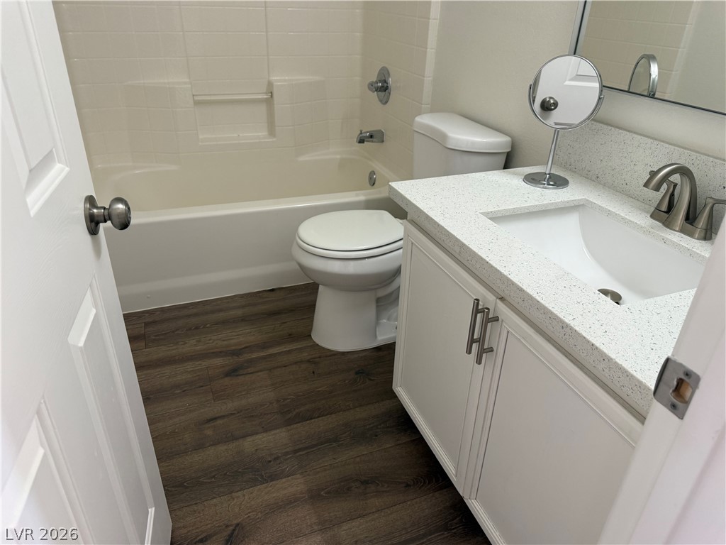 1141 Cathedral Ridge Street Henderson, NV 89052 - Photo 58 of 77 This functional bathroom features a modern vanity and practical tub, perfect for daily routines.