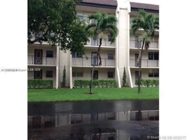a view of a two chairs in front of house
