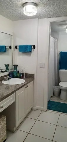 a kitchen with stainless steel appliances a sink and a stove