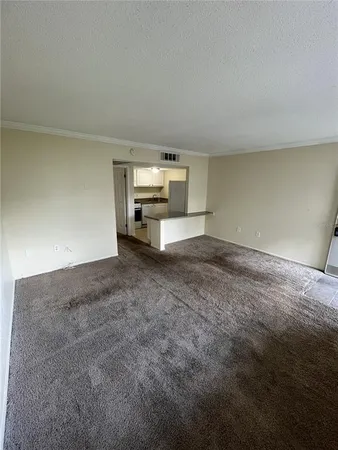 a view of a livingroom with furniture