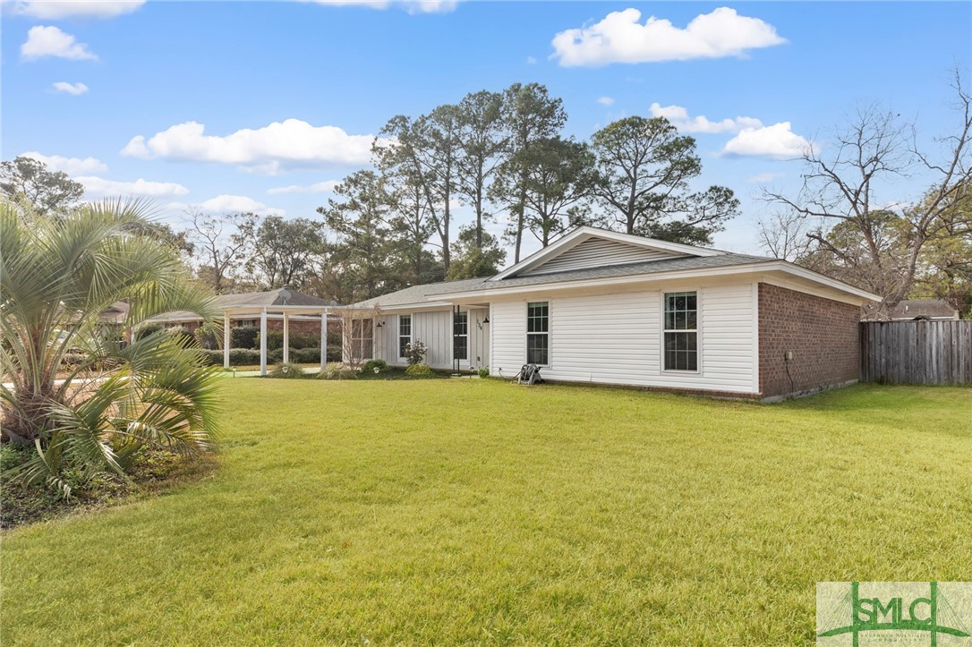 134 Backshell Road Savannah, GA 31404 - Photo 3 of 40 Large front yard and landscaping (summer grass). B