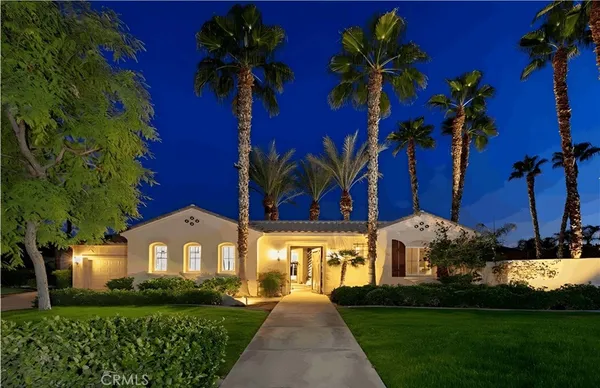 a view of a backyard with a patio