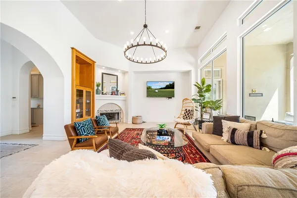 a front view of a house with a large window