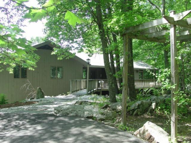 23 Whortleberry Road Redding, CT 06896 - Photo 1 of 1 a backyard of a house with lots of green space