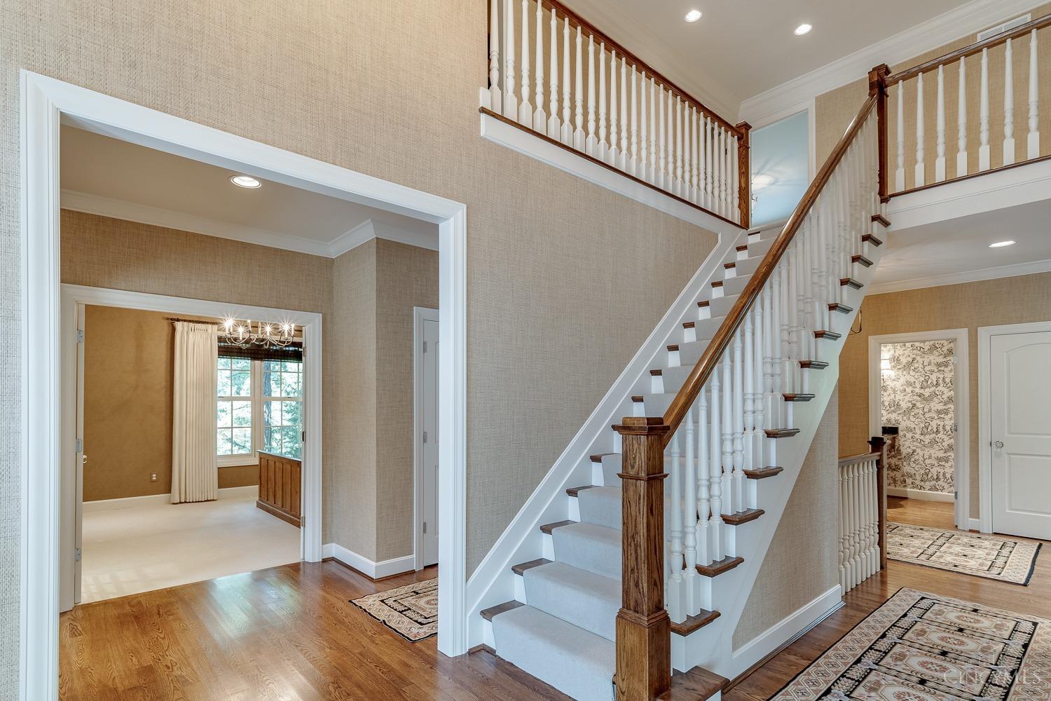 3548 Grandin Road Cincinnati, OH 45226 - Photo 7 of 47 Entry (9' X 8') The 18’ ceiling height, chandelier, and Schumacher grass cloth wallpaper give this home an elegant feel.