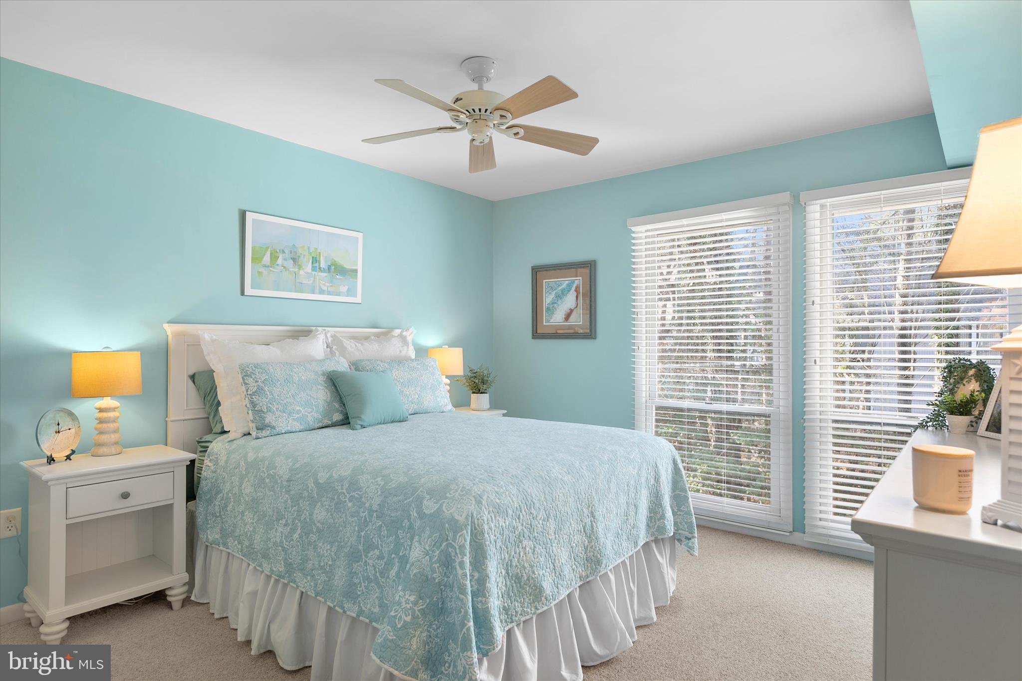 39362 Racquet Lane, Unit 8605 Bethany Beach, DE 19930 - Photo 11 of 53 a bedroom with a bed and a table
