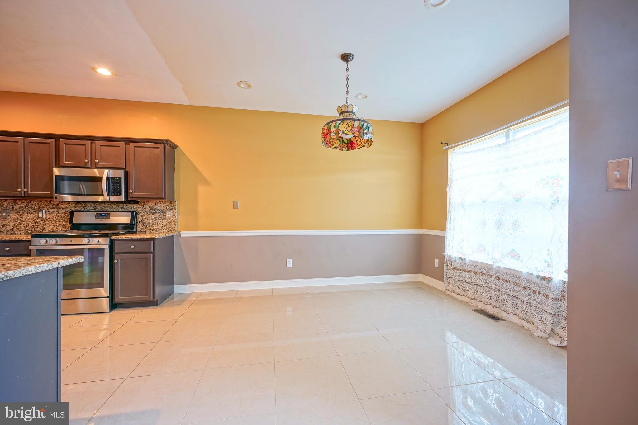 8 Bryce Road Berlin, NJ 08009 - Photo 13 of 36 a view of a kitchen with a sink and microwave