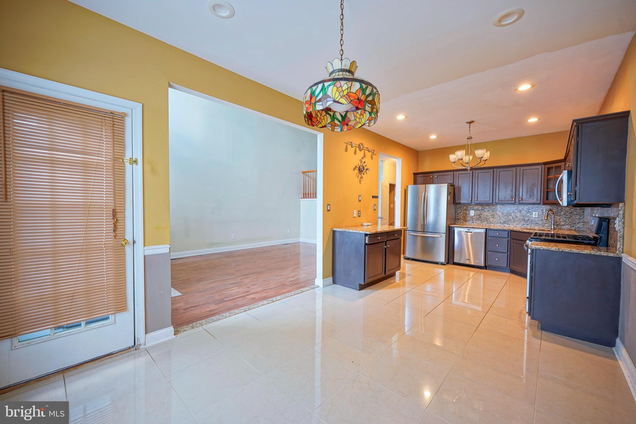 8 Bryce Road Berlin, NJ 08009 - Photo 14 of 36 a view of a kitchen and a chandelier