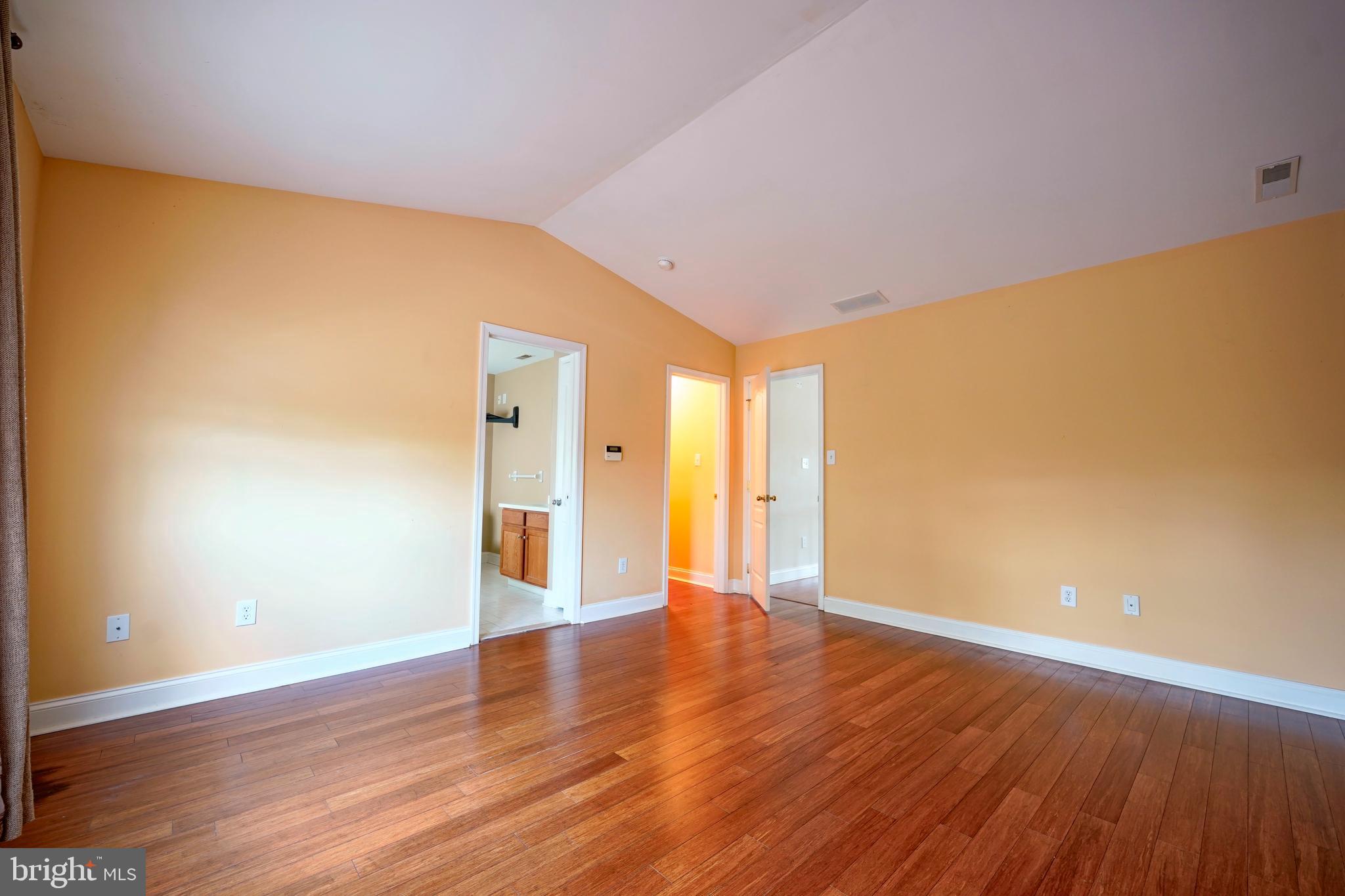 8 Bryce Road Berlin, NJ 08009 - Photo 20 of 36 a view of an empty room with wooden floor