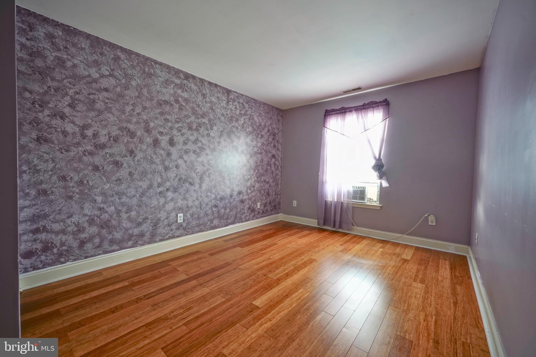 8 Bryce Road Berlin, NJ 08009 - Photo 25 of 36 a view of empty room with wooden floor and fan