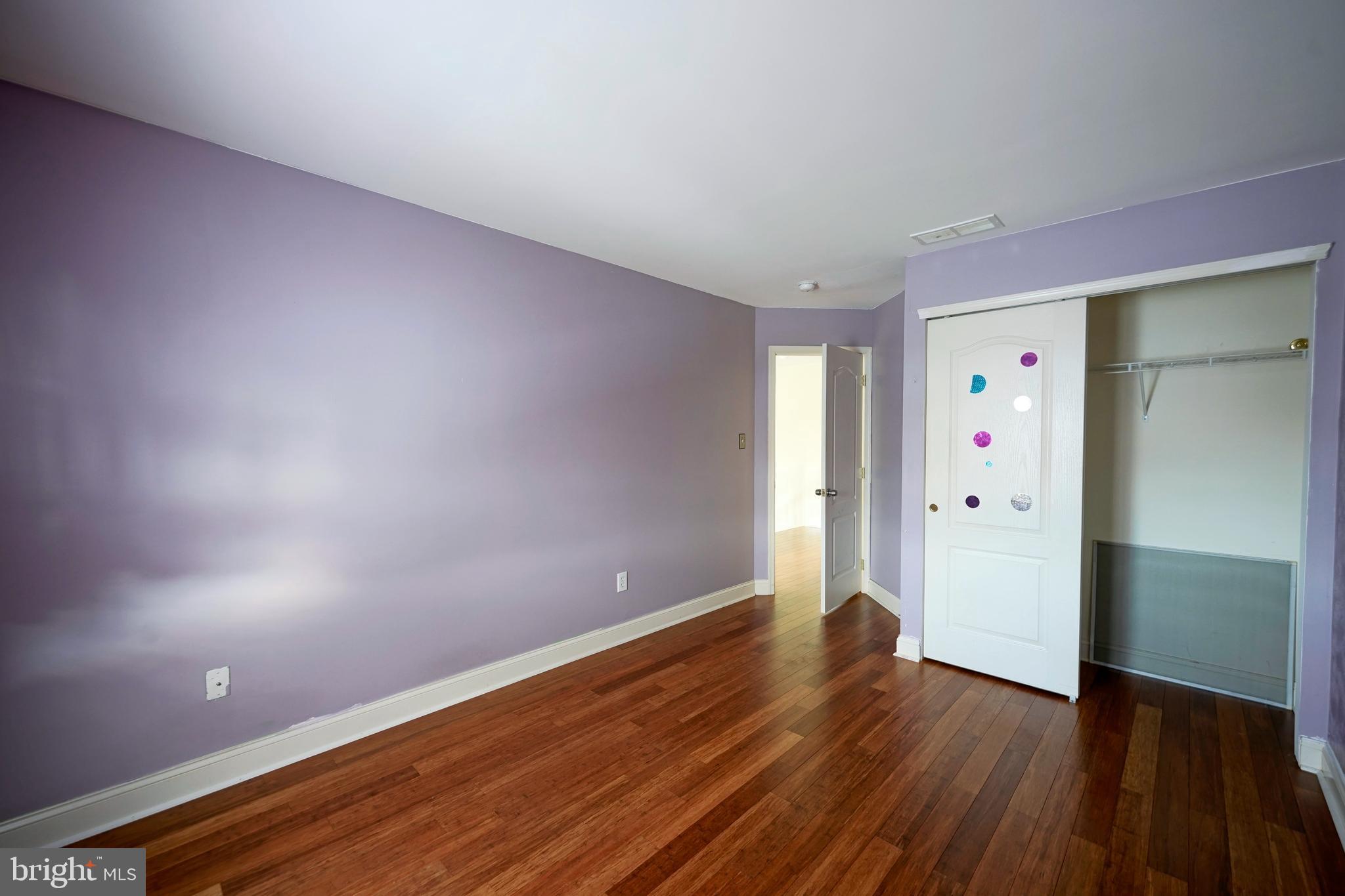 8 Bryce Road Berlin, NJ 08009 - Photo 26 of 36 a view of an empty room with wooden floor