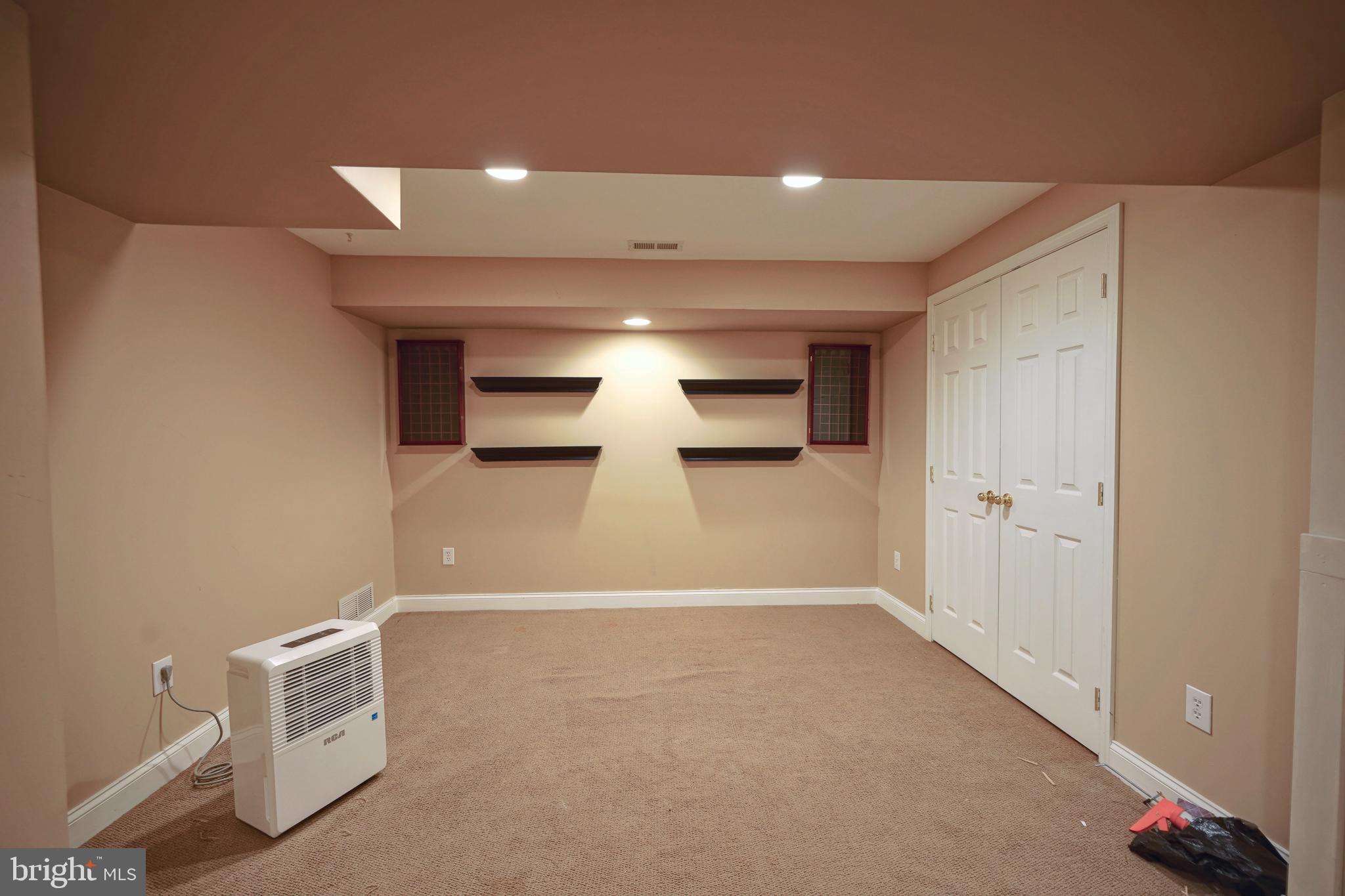 8 Bryce Road Berlin, NJ 08009 - Photo 30 of 36 a view of a livingroom with an empty space and a couch