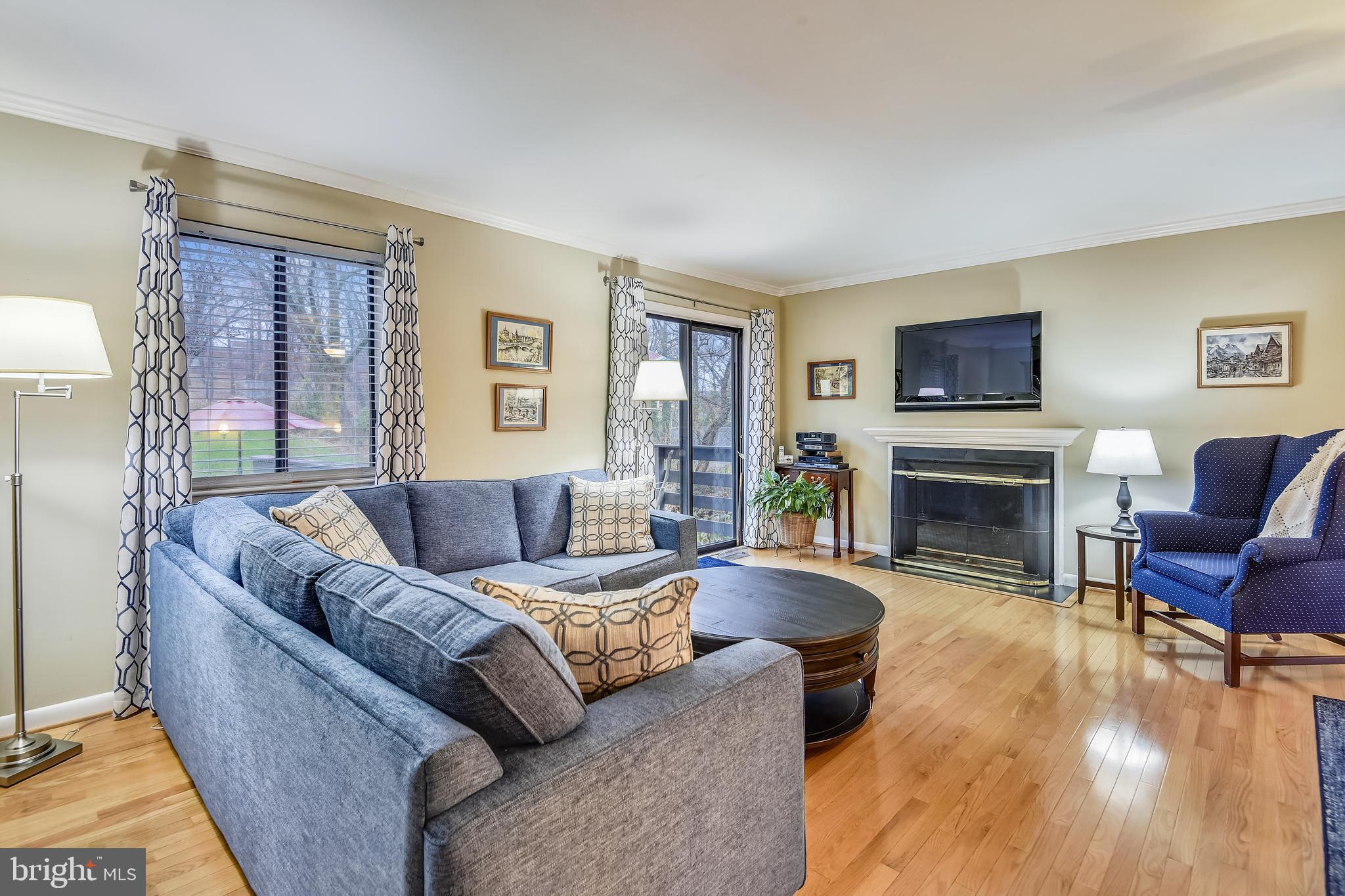 7016 Sherwood Road, Unit 32 Baltimore, MD 21239 - Photo 3 of 41 Wood Burning Fireplace in Living Room