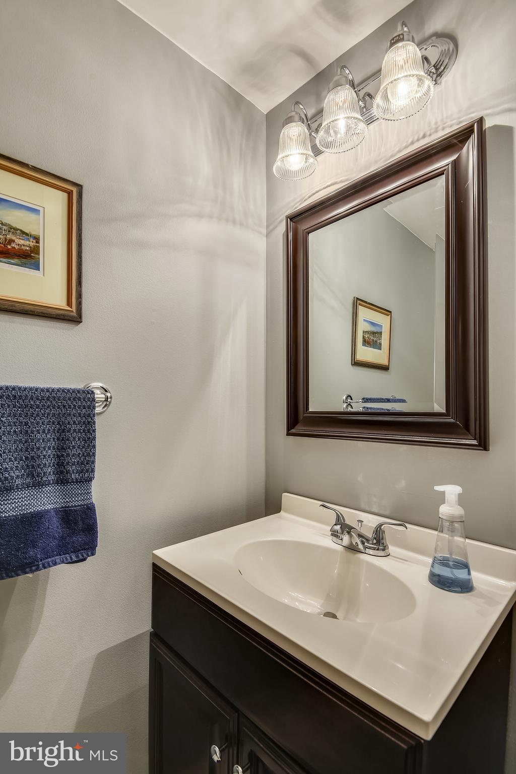7016 Sherwood Road, Unit 32 Baltimore, MD 21239 - Photo 10 of 41 Powder Room Off of Foyer