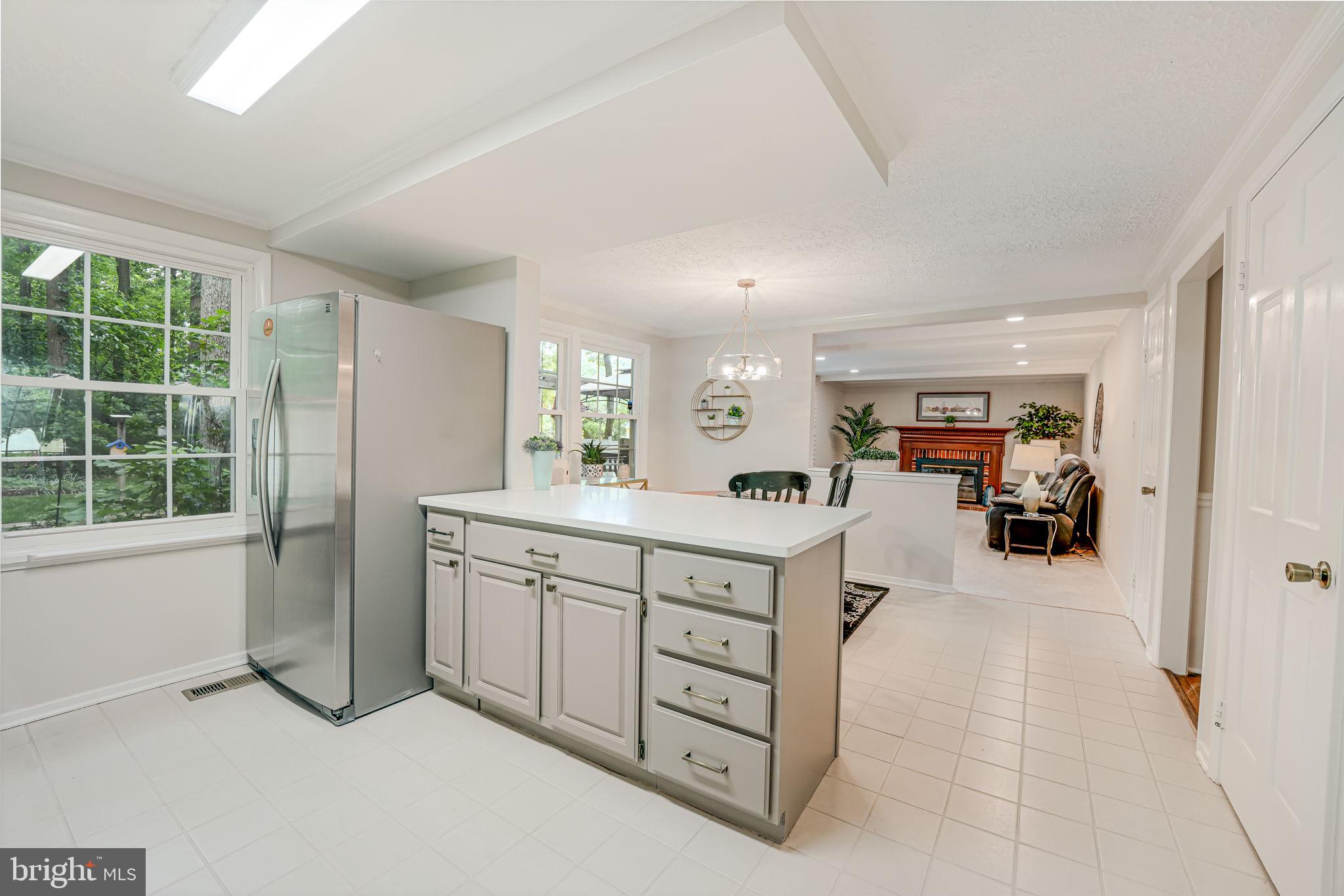 12250 Angel Wing Court Reston, VA 20191 - Photo 13 of 69 View from kitchen back into family room