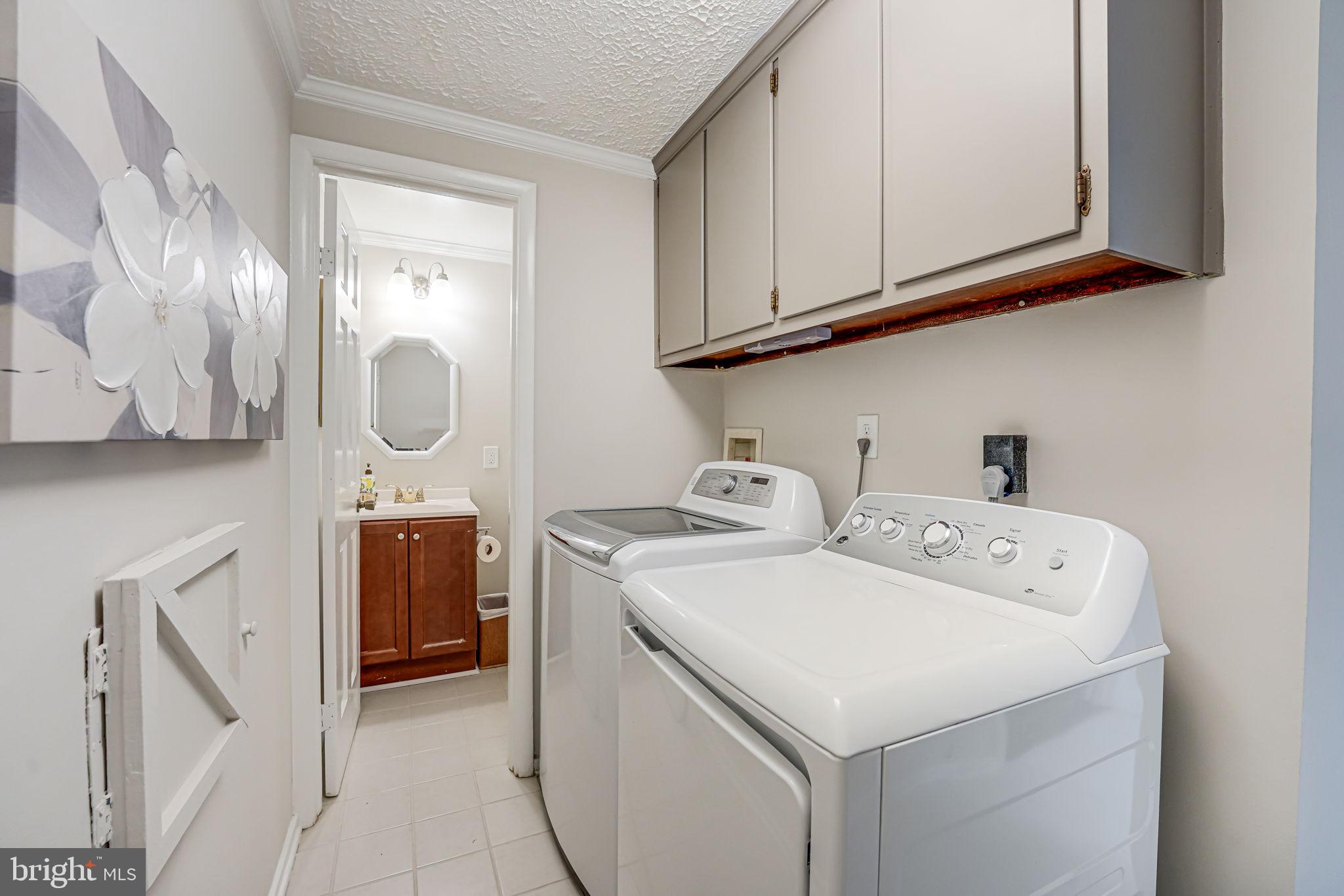 12250 Angel Wing Court Reston, VA 20191 - Photo 15 of 69 Laundry room with additional storage