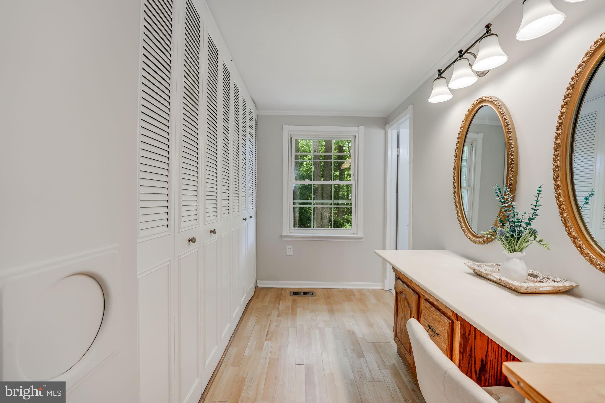 12250 Angel Wing Court Reston, VA 20191 - Photo 23 of 69 Vanity /closets and ensuite bath entrance to right