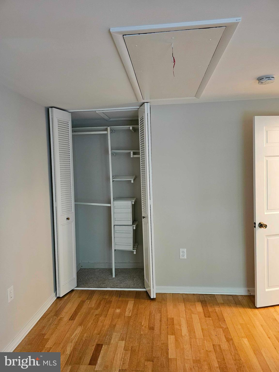 12250 Angel Wing Court Reston, VA 20191 - Photo 40 of 69 Bedroom 5 pull down staircase and closet system