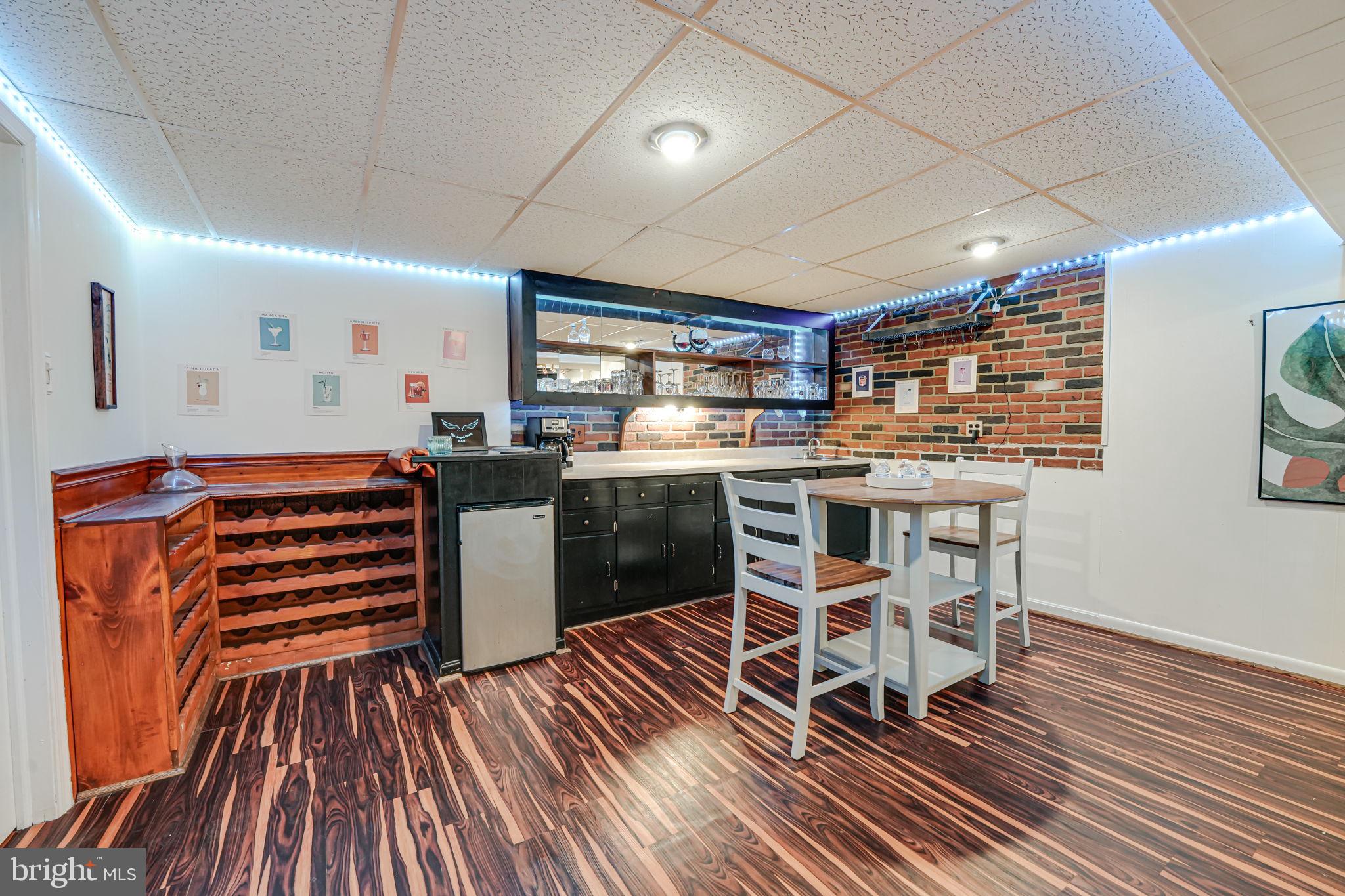12250 Angel Wing Court Reston, VA 20191 - Photo 47 of 69 Built in wet bar, mini fridge, wine racks