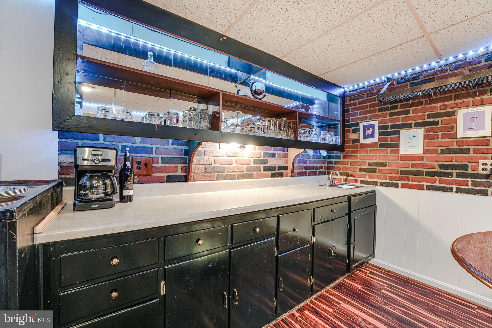 12250 Angel Wing Court Reston, VA 20191 - Photo 48 of 69 Lower level wet bar offers loads of storage