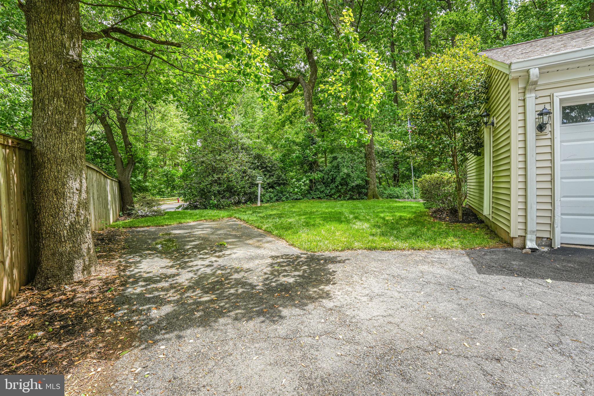 12250 Angel Wing Court Reston, VA 20191 - Photo 57 of 69 Side view of garage - extra parking pad