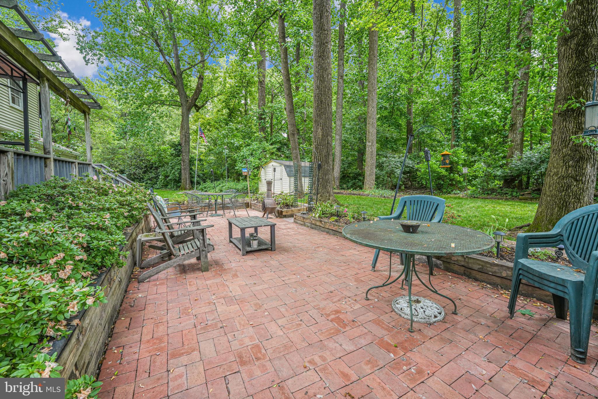 12250 Angel Wing Court Reston, VA 20191 - Photo 65 of 69 Brick patio with timber and stone beds