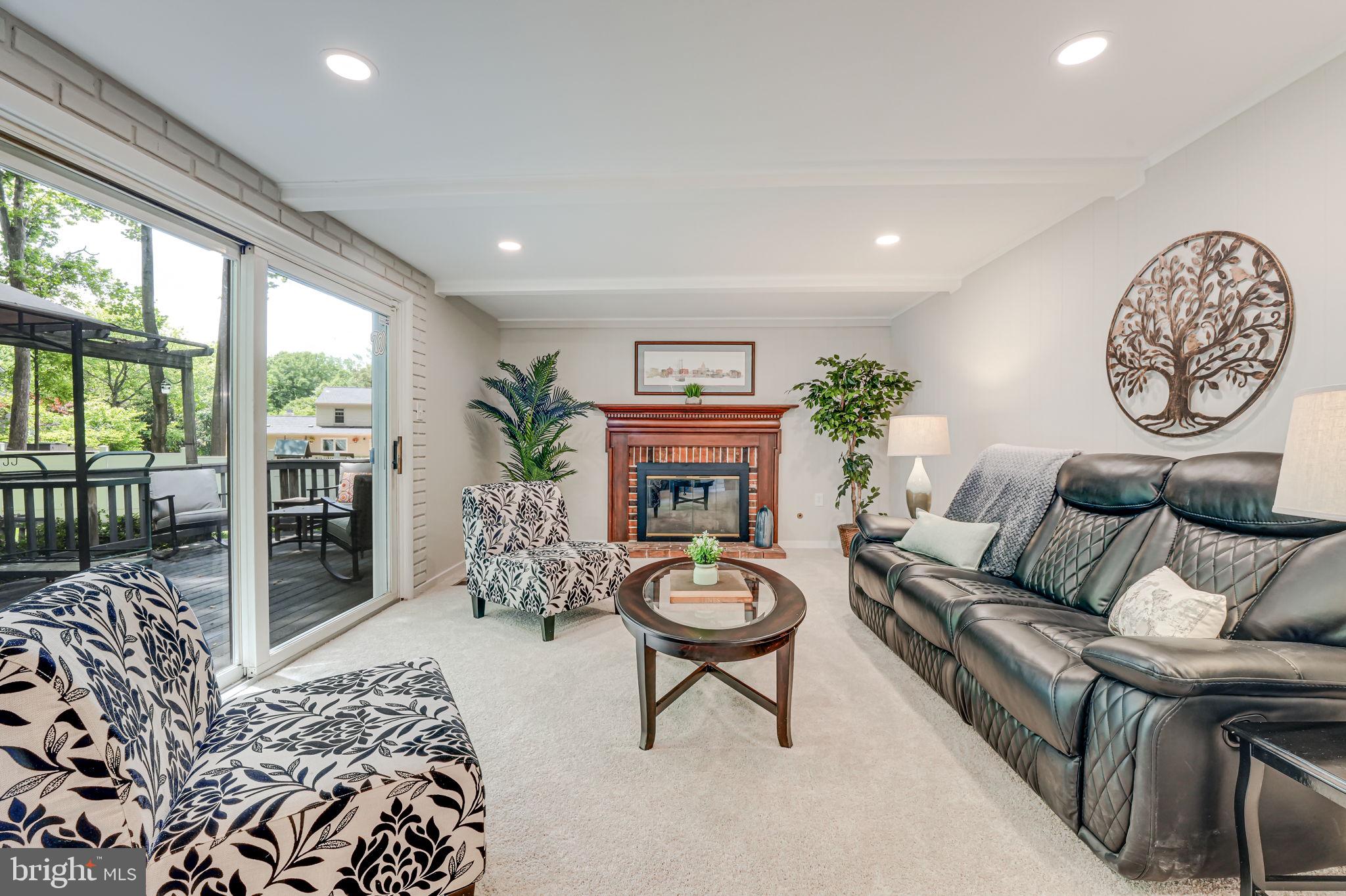 12250 Angel Wing Court Reston, VA 20191 - Photo 7 of 69 Family room with gas fireplace and deck access