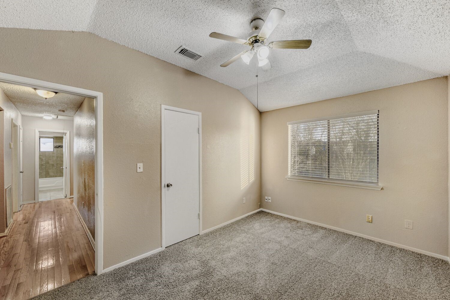 9727 Orangevale Drive Spring, TX 77379 - Photo 16 of 26 a view of an empty room with a window