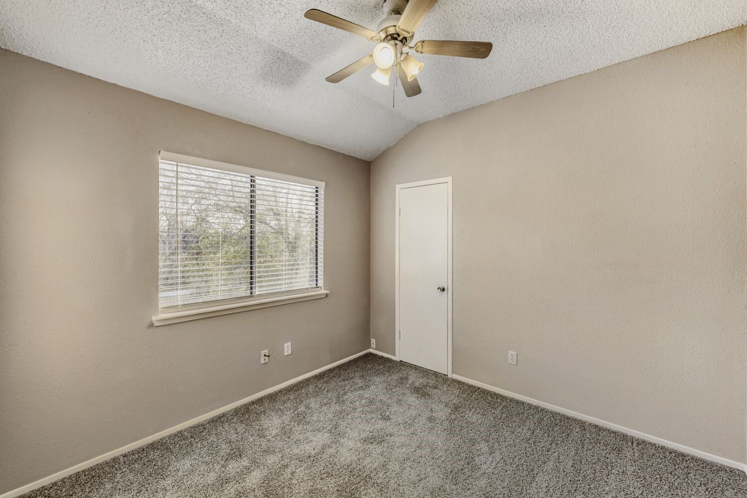 9727 Orangevale Drive Spring, TX 77379 - Photo 18 of 26 a view of an empty room with a window