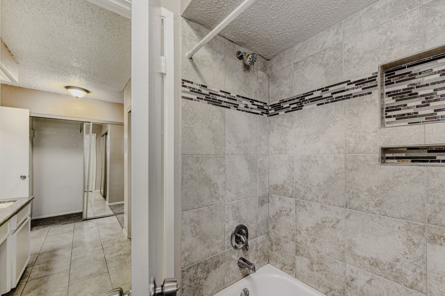 9727 Orangevale Drive Spring, TX 77379 - Photo 21 of 26 a bathroom with a shower and toilet