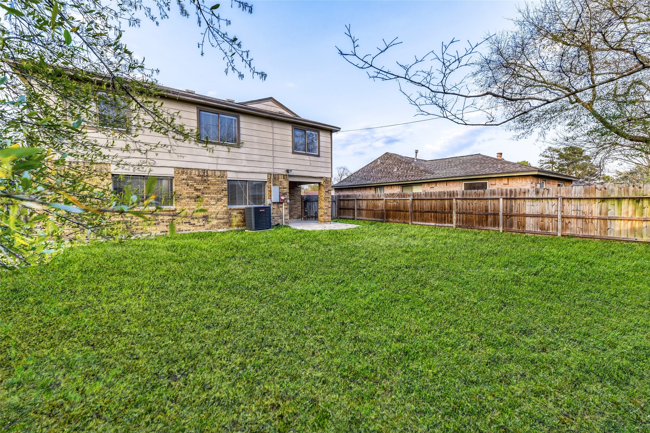 9727 Orangevale Drive Spring, TX 77379 - Photo 22 of 26 front view of a house with a yard