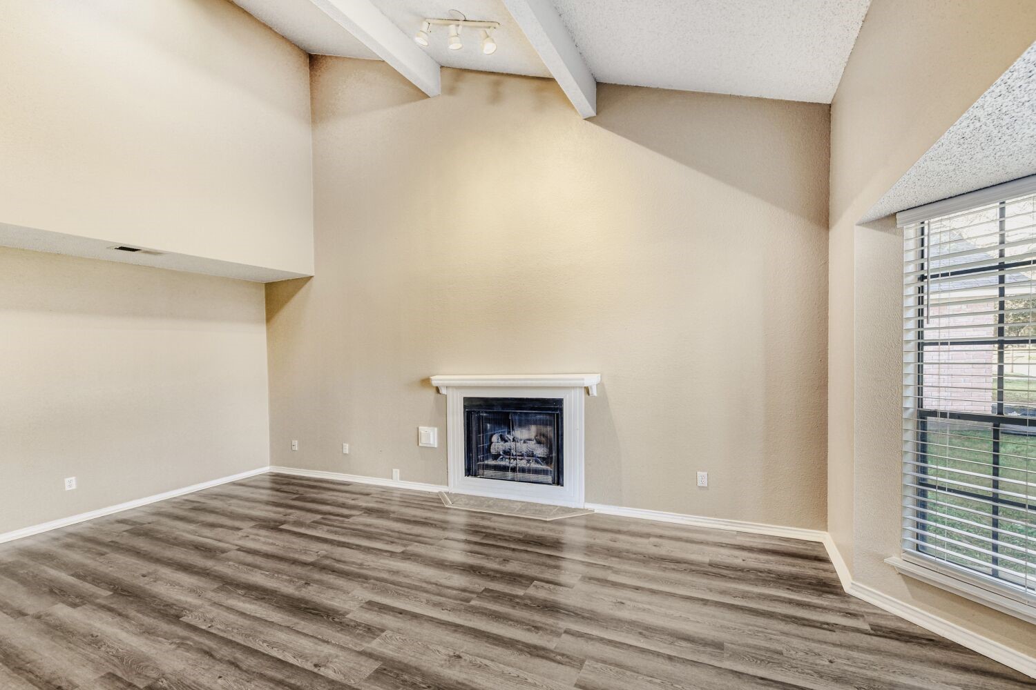 9727 Orangevale Drive Spring, TX 77379 - Photo 3 of 26 a view of empty room with wooden floor and fan
