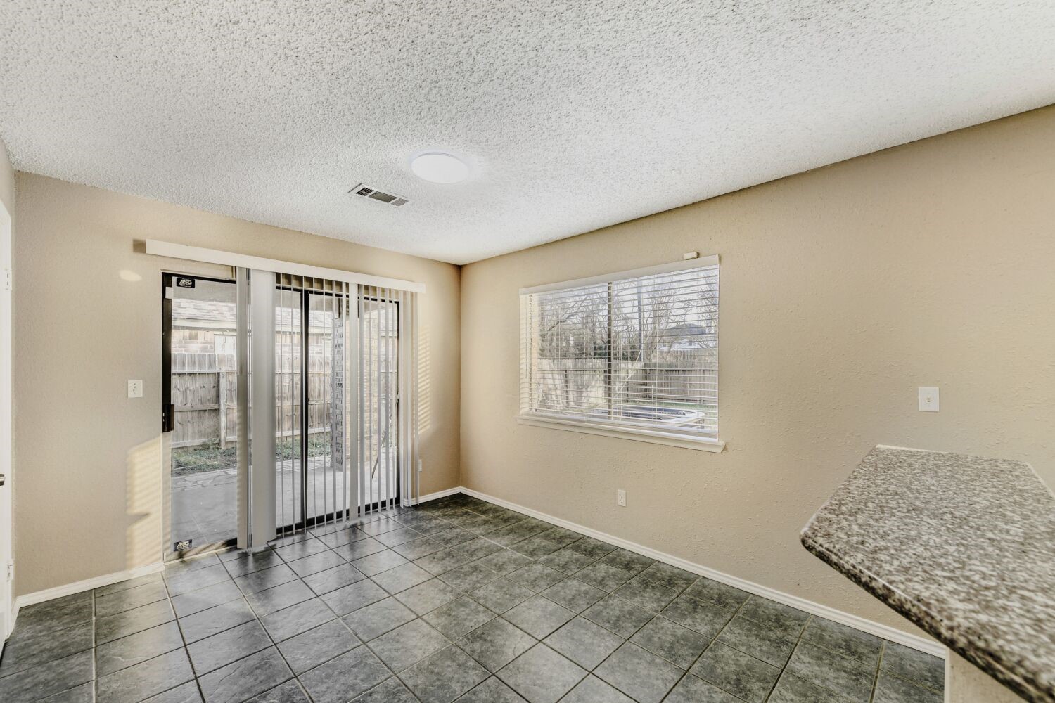 9727 Orangevale Drive Spring, TX 77379 - Photo 7 of 26 a view of an empty room and window