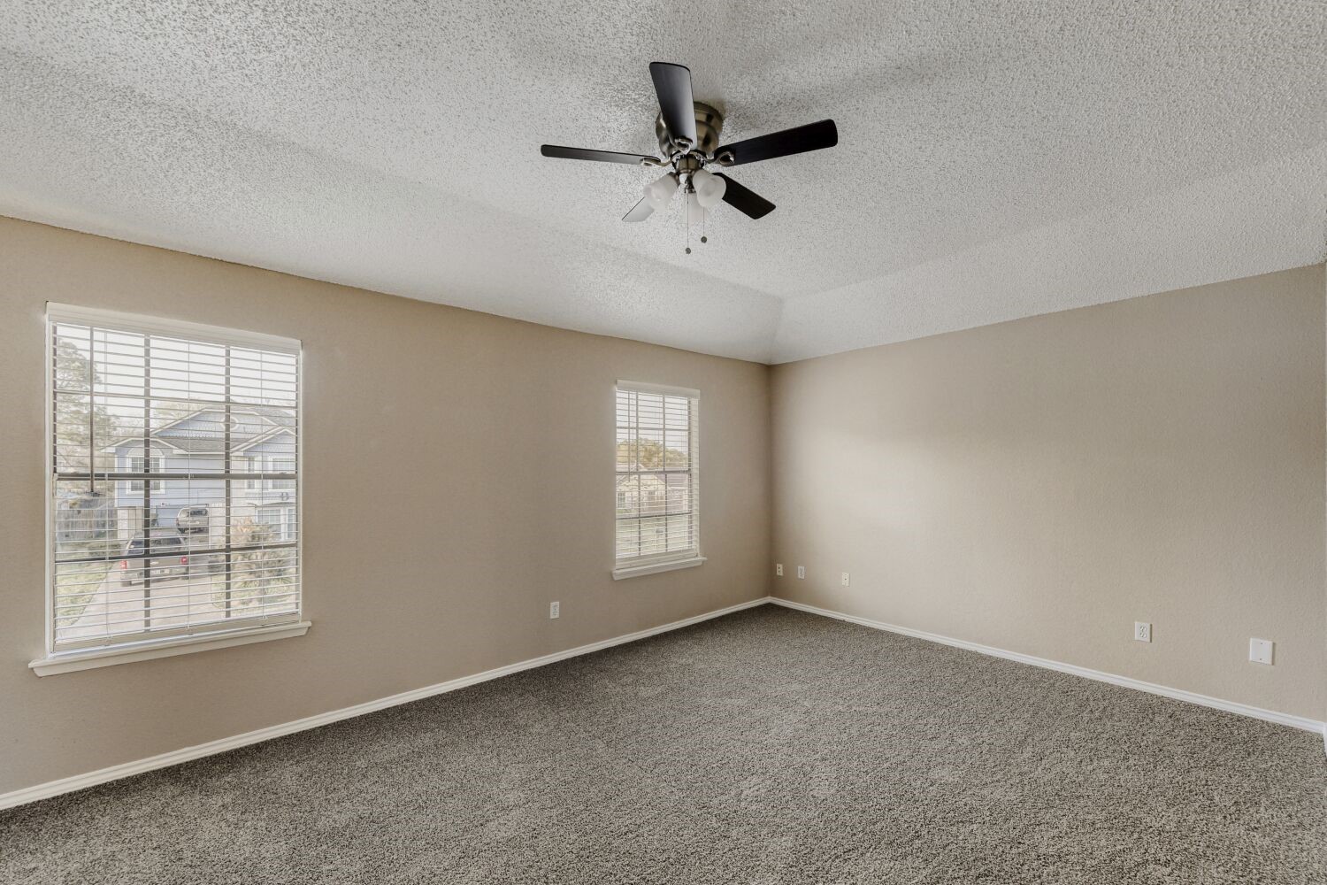 9727 Orangevale Drive Spring, TX 77379 - Photo 9 of 26 a view of an empty room with a window