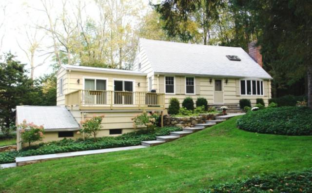 151 Limekiln Road Ridgefield, CT 06877 - Photo 1 of 1 a aerial view of a house with a yard patio and fire pit
