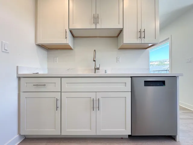 a bathroom with a sink a toilet and a bathtub