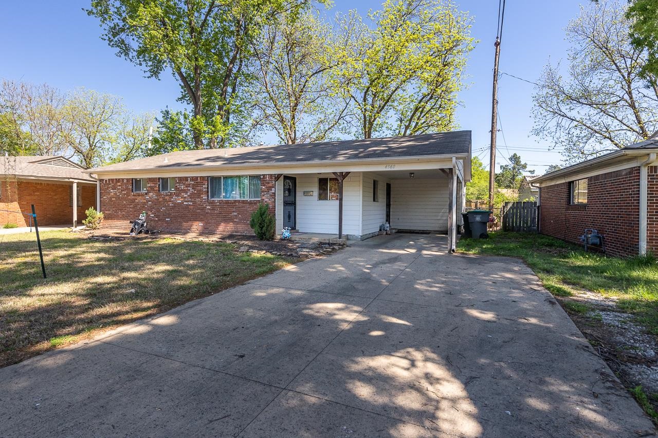 4560 Jamerson Road Memphis, TN 38122 - Photo 3 of 19 a view of a house with a yard