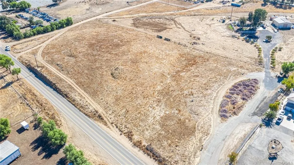 0 Scott Road Menifee, CA 92586 - Photo 2 of 12 a view of a backyard with white house